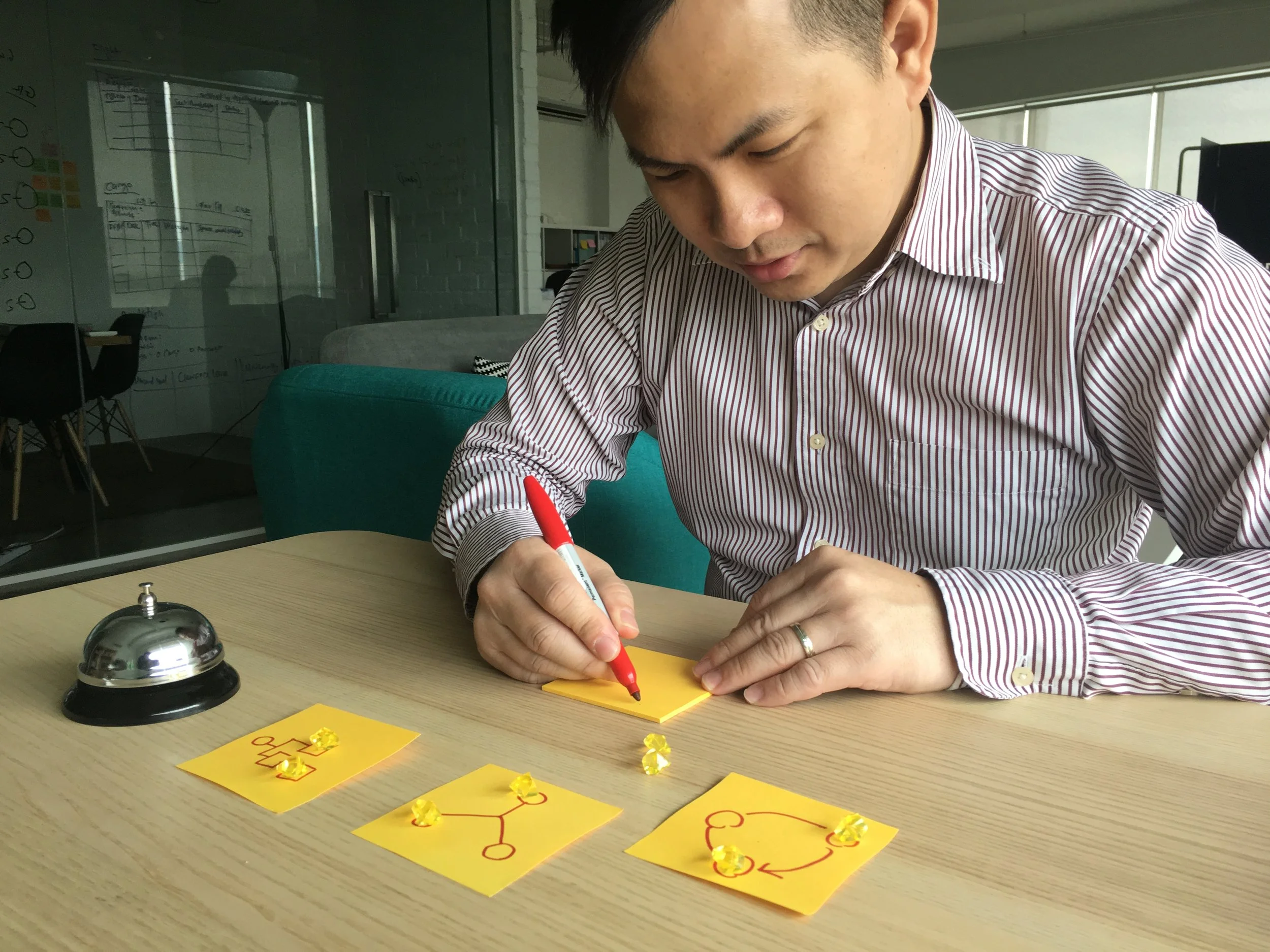Think Codex CEO Andrew Lau prototyping human-centered design concepts